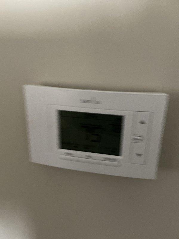 Completed basic monthly cooling maintenance visit on residential HVAC system. Inspected thermostat operation and verified proper temperature display and control functionality. Observed existing 18x25x4 air filter in place; customer to provide replacement filter as not included in basic service plan.