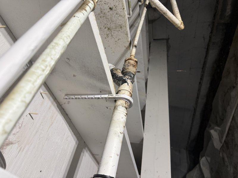 Replaced deteriorated PVC wye fitting on exterior drainage system. The existing wye connection had failed due to age and environmental exposure, showing significant degradation at the joint. Removed compromised section, installed new PVC wye fitting with proper primer and cement, and ensured all connections were secure and leak-free.