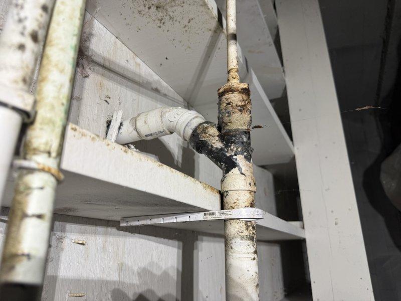 Replaced deteriorated PVC wye fitting on exterior drainage system. The existing wye connection had failed due to age and environmental exposure, showing significant degradation at the joint. Removed compromised section, installed new PVC wye fitting with proper primer and cement, and ensured all connections were secure and leak-free.
