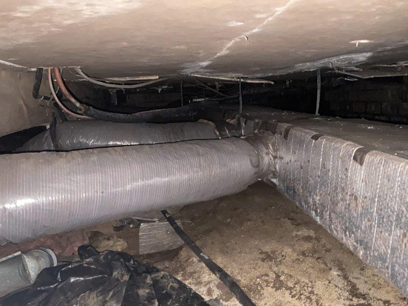 Conducted comprehensive evaluation of existing residential HVAC system following customer's request for second opinion on equipment replacement recommendation. Assessed two outdoor condenser units positioned at building exterior and inspected associated ductwork infrastructure in crawl space. Performed diagnostic testing to verify system performance and operational status. Provided detailed estimate for complete system replacement including equipment specifications, installation requirements, and competitive pricing alternatives for customer comparison and decision-making purposes.