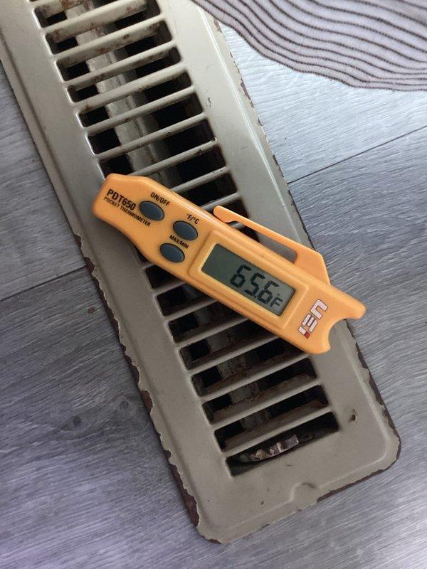 Responded to callback for no cooling complaint on 1-year-old air conditioning system with whole house temperature exceeding 80°F despite recent service. Upon arrival, performed comprehensive system diagnostics using manifold gauges and digital instrumentation to assess refrigerant pressures, temperatures, and overall system performance at the outdoor condensing unit. Supply air temperature measured at floor register showed inadequate cooling at 65.6°F, confirming insufficient system capacity. Diagnosed root cause of cooling deficiency through systematic evaluation of refrigerant charge, airflow, and component operation. Corrected identified issue and verified proper system operation with all parameters within manufacturer specifications. System restored to full cooling capacity with appropriate temperature differential achieved across evaporator coil.