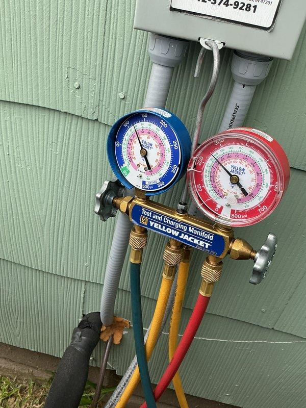 Completed annual cooling maintenance visit on residential split system air conditioning unit. Performed comprehensive inspection of outdoor condenser unit, verified proper operation of compressor and condenser fan motor, and utilized manifold gauge set to check refrigerant pressures and ensure system charge is within manufacturer specifications. All components operating normally with no deficiencies noted at time of service.