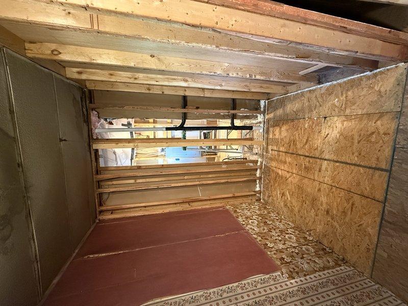 Conducted on-site assessment for comprehensive plumbing renovation project involving installation of gas water heater, two bathtubs, and master bathroom double-sink vanity requiring complete reconfiguration of existing supply and waste piping systems. Evaluated active construction area with exposed framing and structural elements to determine optimal routing for gas lines, hot and cold water supply lines, and drain-waste-vent systems to accommodate new fixtures and meet current plumbing code requirements.