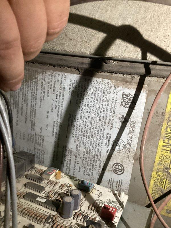 Performed comprehensive AC tune-up on 9-year-old Rheem system (Model: R6C3G1VX41MCA, Serial: W221511062, manufactured 06/2015) addressing reported issues of continuous runtime without cooling, loud humming noise in basement, and inadequate temperature achievement. Inspected electrical components including capacitors and control board, verified proper operation of thermostat communication circuit to resolve intermittent cycling issues. Evaluated airflow restrictions causing humming noise, identified filter-related ductwork obstruction, and assessed system performance to restore proper cooling capacity and automatic shutoff functionality.