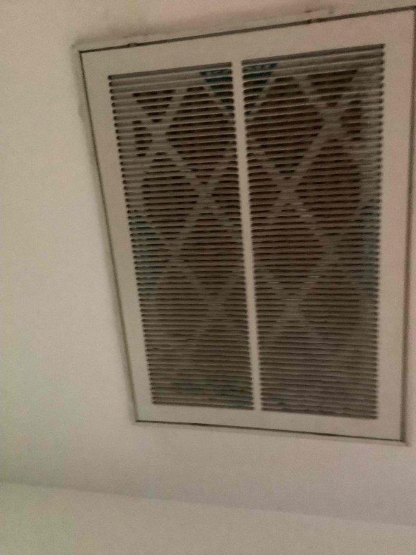 Completed basic monthly cooling maintenance visit on residential HVAC system. Inspected and verified proper operation of thermostat displaying 73°F, checked ceiling-mounted supply register for adequate airflow, and replaced 14x20x1 air filter. System operating within normal parameters with no issues identified.