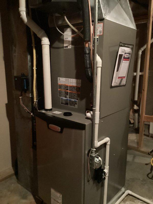 Completed annual cooling system maintenance on Lennox residential HVAC system. Performed comprehensive inspection of indoor furnace unit and outdoor condenser, checking refrigerant lines, electrical connections, and condensate drainage system. Installed new humidifier on indoor unit as requested, integrating with existing ductwork and ensuring proper water supply connection. Verified all components operating within manufacturer specifications, confirmed adequate airflow through system, and tested thermostat functionality. System is ready for cooling season operation.