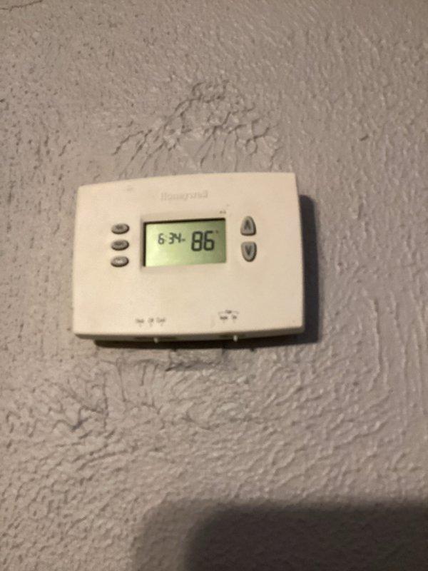 Responded to service call for Guardian system not producing cold air. Upon arrival, verified thermostat displaying 86°F with system running but no cooling. Inspected outdoor condenser unit and found compressor not engaging while fan motor operating normally. Checked electrical connections at disconnect and confirmed proper voltage supply. Diagnosed failed run capacitor preventing compressor from starting. Replaced defective dual run capacitor with OEM equivalent rated at proper microfarad specifications. Tested system operation and confirmed compressor engaging properly with normal amp draw. Verified cold air delivery at supply registers and proper temperature differential across evaporator coil. System restored to normal cooling operation.