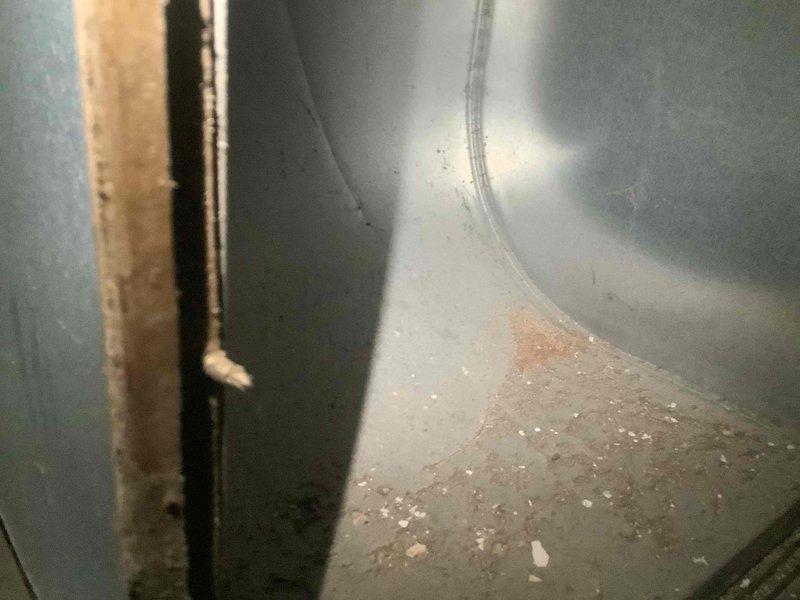 Performed comprehensive site assessment of residential HVAC ductwork system in basement mechanical room for new homeowner requesting duct cleaning estimate. Inspected York furnace/air handler unit, associated supply and return ductwork, and PVC condensate drainage system to evaluate accessibility and condition of duct system. Documented interior duct conditions showing accumulated debris and particulate matter on concrete surfaces beneath system, confirming need for professional duct cleaning services to improve indoor air quality and system efficiency.