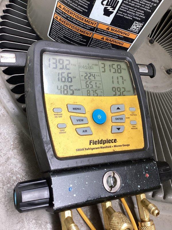 Performed diagnostic evaluation on residential air conditioning system experiencing operational issues. System pressures and temperatures were measured using digital manifold gauges, revealing abnormal high-side pressure readings and temperature differentials indicating thermal expansion valve malfunction and high pressure switch failure. Return visit scheduled to install replacement high pressure switch and TXV to restore proper system operation and refrigerant flow control.