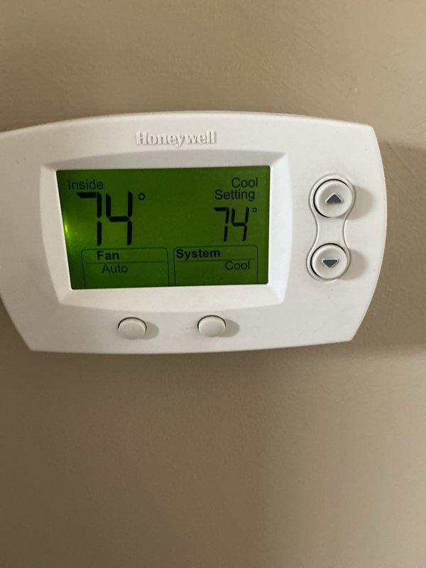 Completed cooling season maintenance on residential HVAC system. Verified Honeywell thermostat operation with system set to cooling mode at 74 degrees with fan in auto mode. Replaced 16x20x1 air filter with new Koch filter as part of preventative maintenance agreement renewal through 2/5/27.