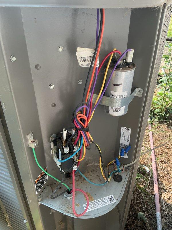 Completed basic monthly cooling maintenance on HVAC system. Performed comprehensive system inspection including interior air handler components with blower motor, capacitor, heat exchanger assembly, and control board, as well as exterior condensing unit electrical compartment with capacitor and contactor. Documented all equipment conditions with photos, confirmed proper wire connections throughout both units, and verified system operational status per standard maintenance protocol.