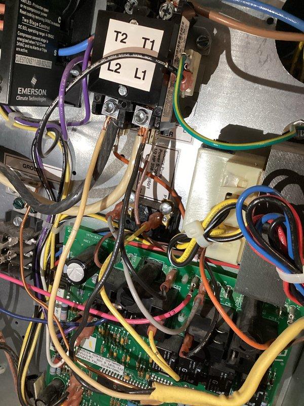 Performed diagnostic inspection on geothermal heat pump system, examining electrical control panel wiring and connections including Emerson Climate Technologies components and circuit boards. Monitored system pressures using gauge equipment to assess loop performance. Follow-up visit required to install loop conditioner pressure ports and retrieve geo needle cover left on-site from previous service call, with warranty information to be reviewed at that time.