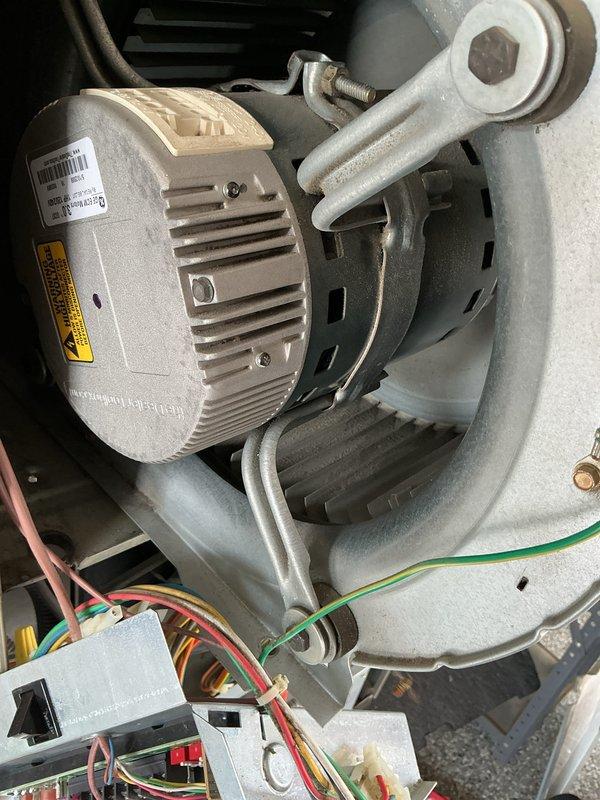 Completed blower assembly cleaning that was previously unfinished during last scheduled maintenance visit. Accessed air handler unit, removed and thoroughly cleaned squirrel cage blower wheel to remove accumulated dust and debris from fins. Inspected blower motor assembly, electrical connections, and control components for proper operation and secure mounting, confirming all wiring harnesses and relays remain in good working condition with no signs of damage or deterioration.