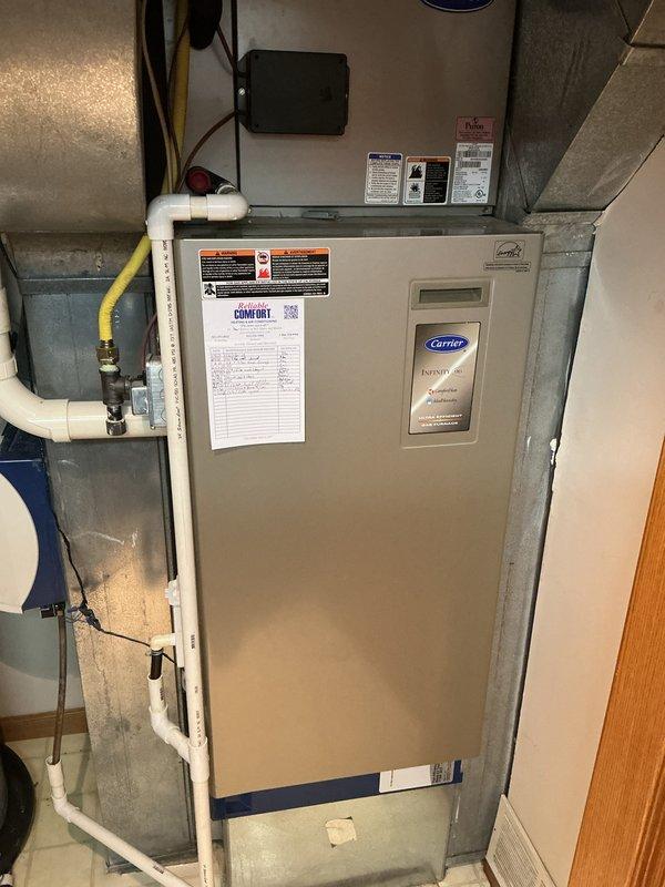 Completed monthly basic cooling maintenance visit on Carrier Infinity air handler system. Performed standard system inspection, verified operational parameters with digital temperature measurements, and confirmed proper condensate drain function. Unit operating within normal specifications with no issues identified during this routine preventative maintenance service.