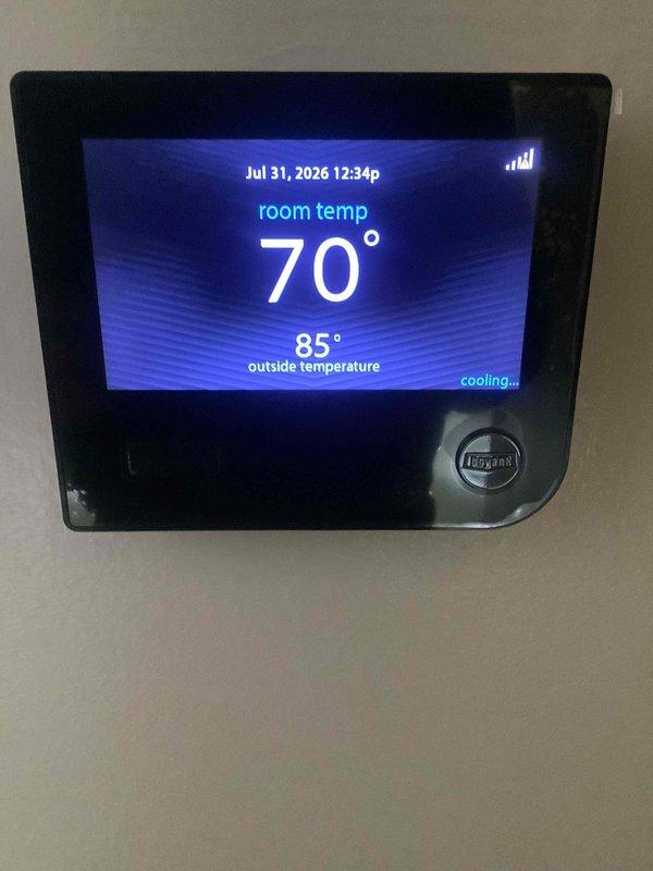Completed monthly recurring Basic Plus cooling maintenance visit on residential HVAC system utilizing Puron refrigerant. Performed comprehensive system inspection of Digital Platinum model unit, verified all warning labels and specifications were intact and legible. Replaced 16x25x4 air filter per maintenance protocol. Confirmed thermostat operation with system actively cooling, maintaining room temperature at 70°F with outdoor ambient temperature reading 85°F. All components operating within normal parameters with no deficiencies noted.