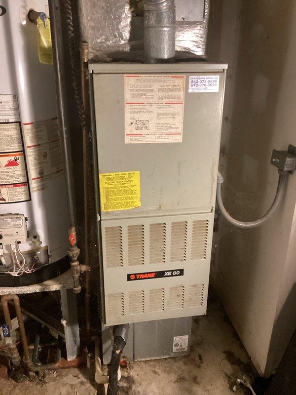 Performed tune-up and maintenance on Trane XE 1100 air conditioning system with matching XE 80 furnace. Added R22 refrigerant to system per customer request to restore proper cooling capacity and system performance.