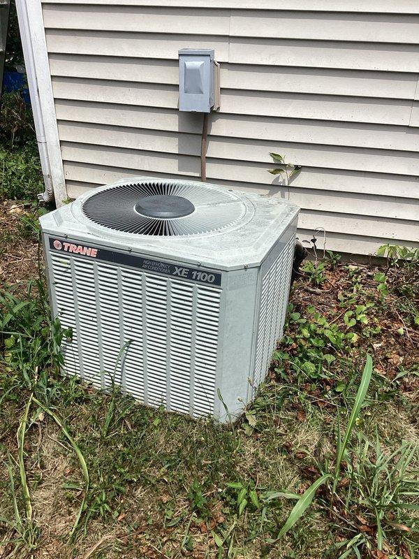 Performed tune-up and maintenance on Trane XE 1100 air conditioning system with matching XE 80 furnace. Added R22 refrigerant to system per customer request to restore proper cooling capacity and system performance.