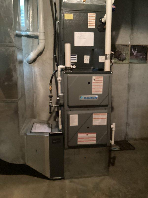 Completed routine cooling maintenance on Daikin multi-zone HVAC system as part of monthly membership service. Inspected air handler and heat pump components, verified thermostat operation displaying 73°F in main room, checked refrigerant lines and condensate drainage system, and confirmed all equipment operating within normal parameters.