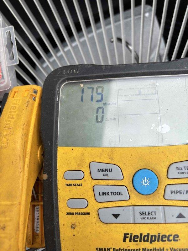 Completed full system installation of Lennox air conditioning unit and gas furnace with air handler. Performed vacuum test achieving 179 microns, confirming system integrity and proper evacuation of refrigerant lines. All electrical connections, condensate drain lines, and refrigerant piping installed and verified operational per manufacturer specifications.