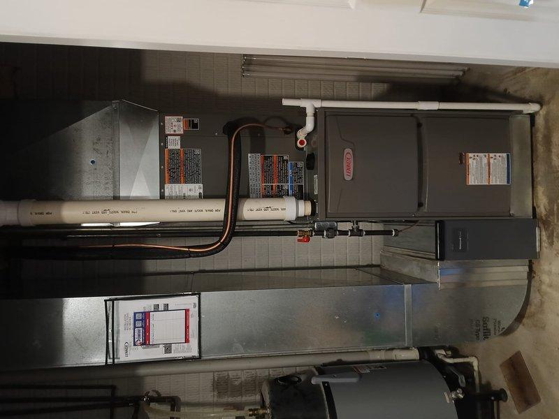 Completed full system installation of Lennox air conditioning unit and gas furnace with air handler. Performed vacuum test achieving 179 microns, confirming system integrity and proper evacuation of refrigerant lines. All electrical connections, condensate drain lines, and refrigerant piping installed and verified operational per manufacturer specifications.