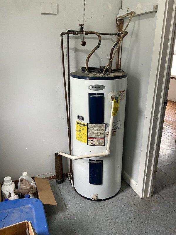 Conducted an HVAC estimate for furnace replacement at a recently purchased residential property. Assessed existing mechanical equipment in utility room, including current water heater installation and existing HVAC system configuration. Documented equipment specifications, utility connections, and installation space requirements to provide comprehensive replacement options for the new homeowner.