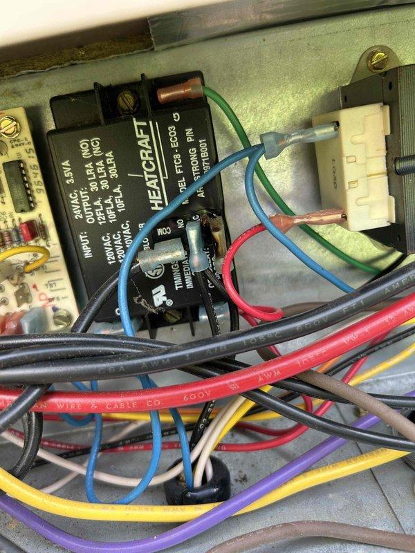 Responded to no cooling complaint on residential air conditioning system. Upon arrival, confirmed indoor airflow present, evaporator coil clear of frost, and capacitor previously replaced. Performed diagnostic evaluation of outdoor condensing unit and electrical control components, including inspection of HEATCRAFT relay module and associated wiring connections. Documented system conditions and control panel configuration for further troubleshooting of cooling deficiency.