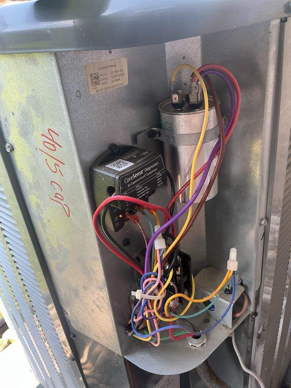 Completed annual cooling maintenance per contract on 3-year-old Goodman and Amana AC systems. Performed comprehensive tune-up including inspection of electrical components, capacitor testing (verified 40.5 MFD rating), examination of CorSense control module and wiring connections, and filter assessment. All systems operating within normal parameters with no immediate repairs required.