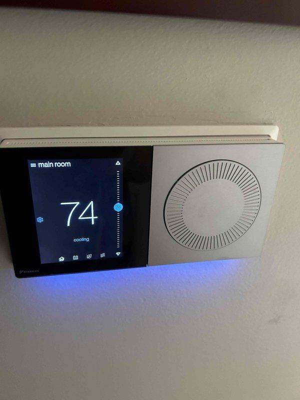Completed Comfort Care monthly maintenance on residential cooling system. Performed comprehensive inspection of furnace and air handler unit, verified proper operation of smart thermostat displaying 74°F in cooling mode, and inspected all mechanical components including ductwork, PVC condensate drainage lines, and associated plumbing connections in utility room.