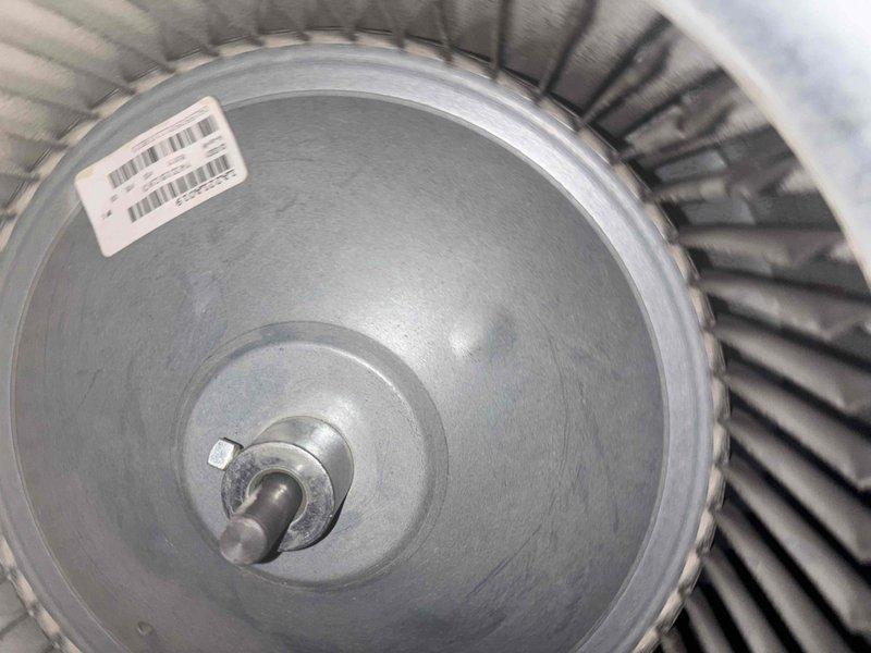 Completed monthly CCC basic maintenance on cooling system, including inspection of blower wheel assembly and capacitor component. Both components showed normal operational condition with dust accumulation on interior surfaces; system operational upon completion of service visit.
