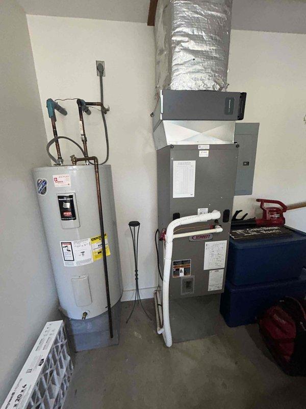 Completed annual cooling maintenance and inspection per service agreement. Performed comprehensive system evaluation of outdoor condensing unit and indoor air handler, checked refrigerant levels and pressures, inspected electrical connections and components, tested thermostat operation and calibration, cleaned condenser coils, verified proper airflow and drainage, and replaced 20x20x4 air filter. All components operating within manufacturer specifications with no deficiencies noted.