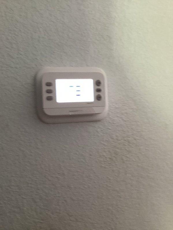 Responded to service call regarding unusual clicking sounds from Guardian brand air conditioning system prior to startup. Reviewed customer-provided video documentation showing intermittent clicking before compressor engagement. Performed on-site inspection of outdoor condenser unit and indoor thermostat controls to diagnose startup sequence abnormality and verify system operation.