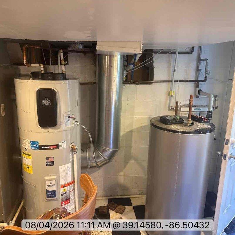 Installed a 50-gallon heat pump water heater in basement utility room, connecting all copper supply and discharge piping to existing plumbing infrastructure. Verified unit registration with AHRI certification database (reference #217508889) and confirmed proper operation of digital control panel and energy-saving heat pump system.