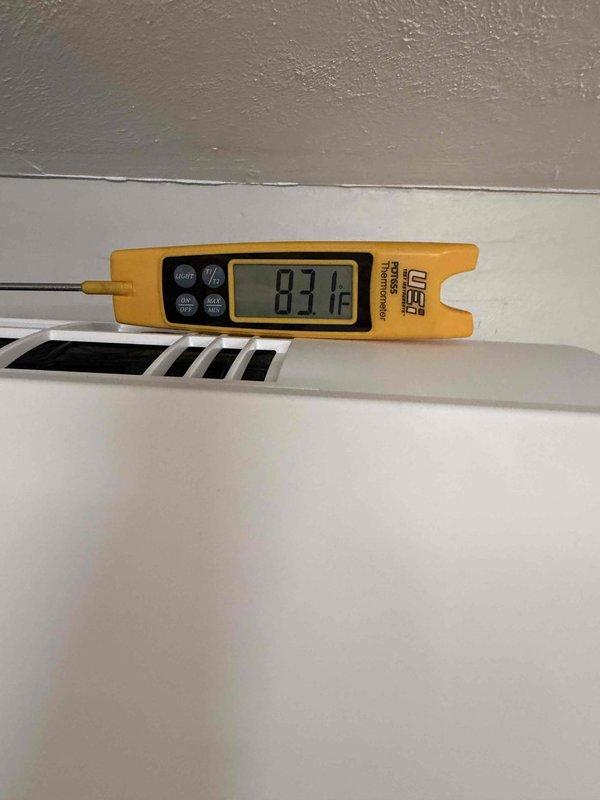 Replaced failed Daikin mini split system under manufacturer warranty. Performed complete system installation, evacuated refrigerant lines, charged system to specifications, and verified proper operation with supply air temperature reading 87.1°F and confirmed system pressures within normal operating range.