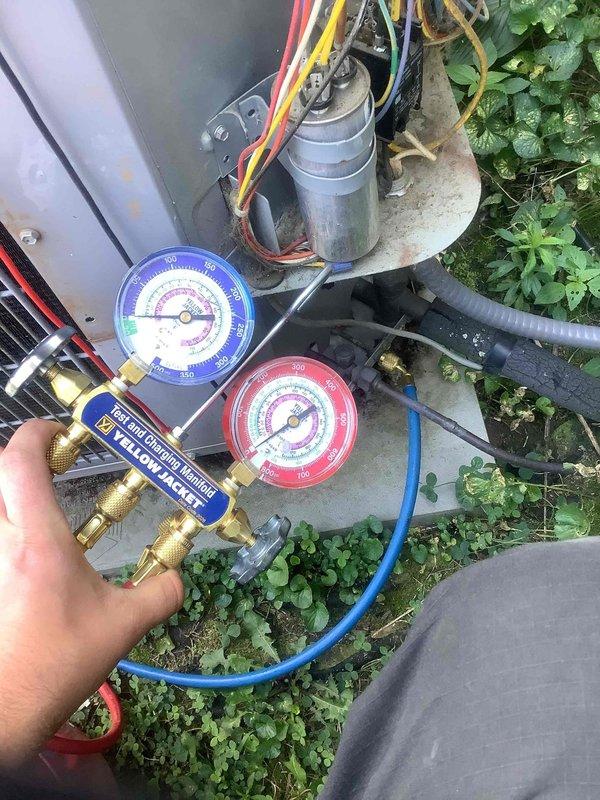 Responded to no-cooling call where system had stopped operating the previous day. Performed diagnostic evaluation using manifold gauge set to check refrigerant pressures and system operation. Inspected outdoor condensing unit components including compressor, capacitor, and electrical connections to determine cause of system failure.