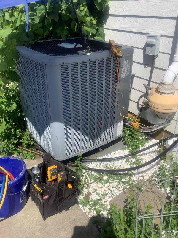 Completed basic monthly cooling maintenance on residential HVAC system. Performed standard inspection of outdoor condenser unit and verified Honeywell ProSeries thermostat operation showing system cooling properly with setpoint at 68°F and indoor temperature at 72°F. All components operating within normal parameters with system in cooling mode and fan set to auto.