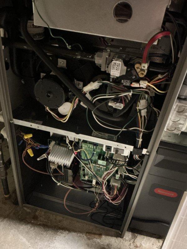 Performed comprehensive cooling maintenance on Lennox condensing unit and air handler system. Inspected outdoor unit including condenser coils, fan operation, and refrigerant line connections; verified electrical disconnect and conduit installation. Evaluated indoor air handler components including control board, blower assembly, and electrical connections. All wiring harnesses and safety controls found secure and operational. System operating within normal parameters upon completion of maintenance protocol.