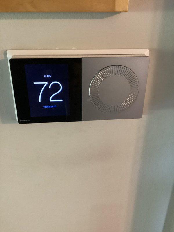 Completed basic monthly cooling maintenance on Daikin system. Thermostat operating properly, displaying 72°F and actively cooling to setpoint of 71°F. Outdoor condenser unit inspected and found operational, though vegetation clearance around unit is recommended for optimal airflow and efficiency. Customer reported reduced airflow to bedroom; system currently cooling adequately, but airflow concern noted for future monitoring and potential ductwork inspection.