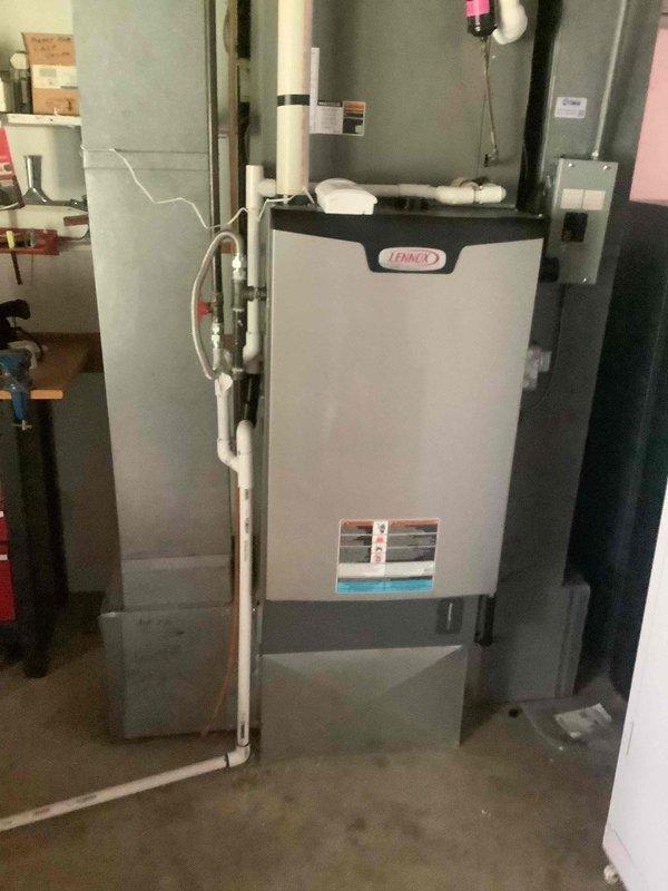 Completed comprehensive cooling maintenance on Lennox HVAC system. Performed standard preventive maintenance procedures including system inspection, operational testing, and verification of thermostat functionality. System operating normally with Emerson programmable thermostat maintaining proper temperature control at 73 degrees.