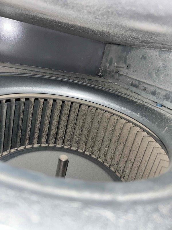 Completed seasonal cooling maintenance on an 11-year-old air conditioning system, including full system inspection, performance testing, and installation of a Honeywell T5 smart thermostat. Inspected outdoor condenser unit and indoor blower assembly, noting dust accumulation on blower wheel fins consistent with normal operation. All components tested and operating within specifications; system ready for cooling season.