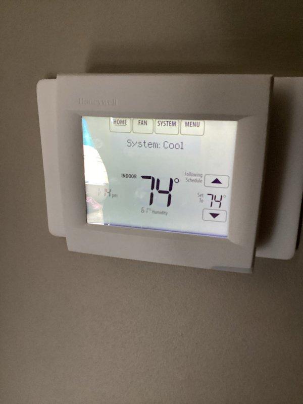 Completed basic monthly HVAC maintenance on Daikin cooling system. Inspected and serviced furnace unit, verified thermostat operation showing system cooling to setpoint of 74°F, and confirmed proper system functionality. Customer requires 20x25x4 filter which was not included in this service visit.