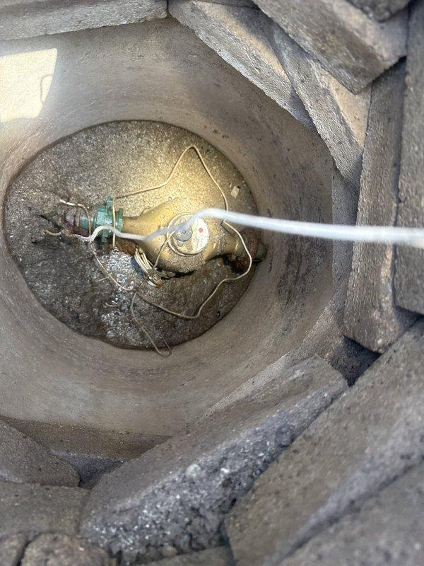 Responded to customer report of abnormally high water consumption indicated by elevated utility billing. Conducted thorough inspection of accessible plumbing infrastructure to locate source of suspected water leak. Accessed wall cavity through existing access panel to examine copper supply lines, PVC drainage system, and shutoff valve assembly. Inspected all visible pipe connections, joints, and fixtures for signs of active leaks, moisture damage, or water intrusion. Documented findings with photographic evidence of plumbing components and surrounding areas for assessment and customer records.