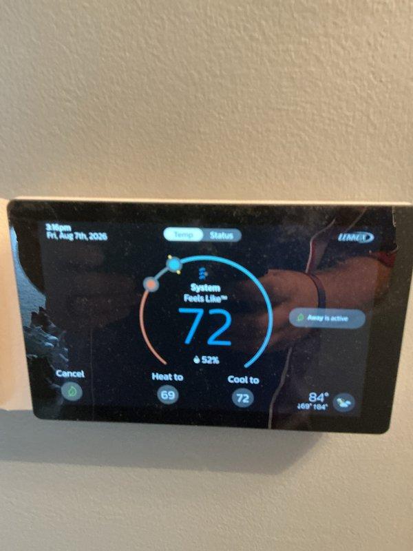 Completed annual cooling maintenance visit on residential HVAC system. Performed comprehensive inspection of furnace and air handling components, verifying proper operation of gas valve assembly, blower motor, and control board. Inspected Honeywell control board for proper connections and functionality, confirmed all wire harnesses securely connected with no signs of overheating or damage. Verified Lennox thermostat operation, displaying 72°F indoor temperature with system set to cool to 72°F, heating setpoint at 69°F, and outdoor temperature reading 84°F. Confirmed humidity level at 52% and thermostat communication with HVAC equipment functioning correctly. Inspected blower motor assembly and pulley system for proper operation and alignment. Provided 16x25x1 air filter as part of maintenance agreement. All system components operating within normal parameters with no deficiencies noted at time of service.