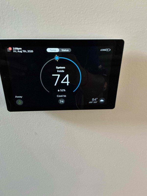 Completed annual basic cooling maintenance visit on Lennox system under active comfort club membership. Performed standard preventative maintenance procedures, verified thermostat operation displaying 74°F setpoint with system cooling properly, and confirmed outdoor unit functionality with 84°F ambient conditions. Provided 20x25x4 air filter as included with membership plan.