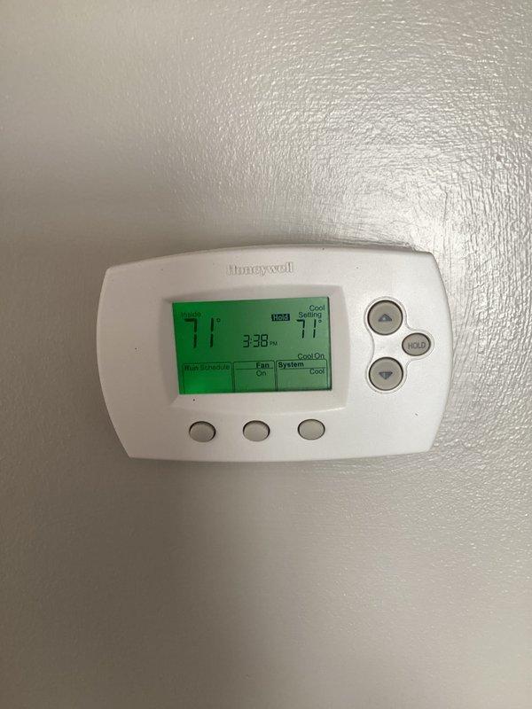 Completed comprehensive cooling maintenance on residential split system air conditioning unit. Performed standard CCC protocol including inspection of outdoor condenser unit, verification of thermostat operation showing system actively cooling at 71 degrees, and assessment of all accessible components. Condenser unit exterior inspected and found in good operating condition with proper clearances maintained around equipment. Customer advised that 20x20x4 filter replacement is not included in basic monthly maintenance service.