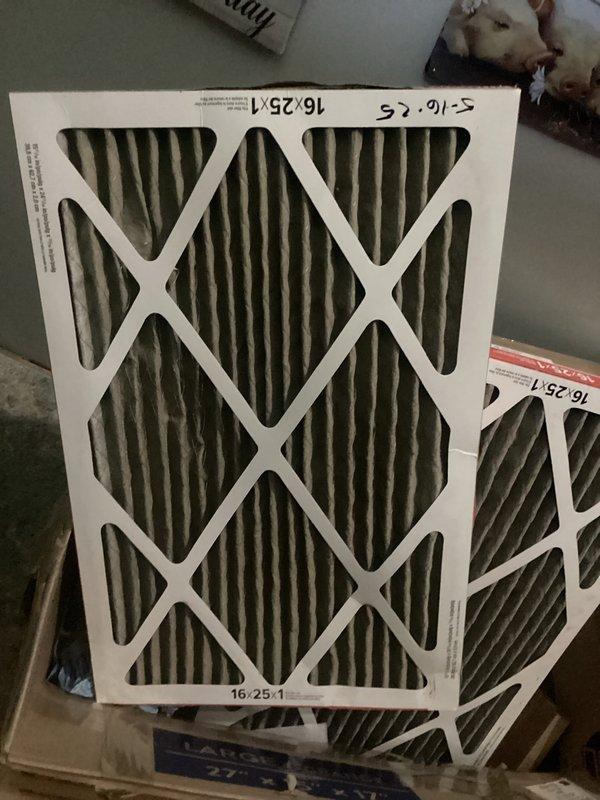 Responded to emergency no-cooling call and performed system diagnostics. Identified restricted airflow due to dirty air filters as the primary cause of inadequate cooling performance. Replaced two filters (16x25x1 and 16x16x5) with new units, restoring proper airflow to the system. Verified thermostat operation and confirmed system was cycling properly with current temperature reading of 86°F and setpoint range of 68-70°F. System returned to normal cooling operation upon completion of filter replacement.