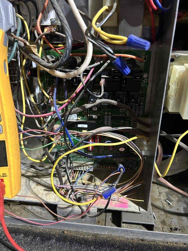 Responded to high pressure warning displayed on system. Performed diagnostic testing of electrical control panel and measured amperage draw at 23.0 amps using clamp meter to verify compressor operation and identify potential causes of high pressure condition.