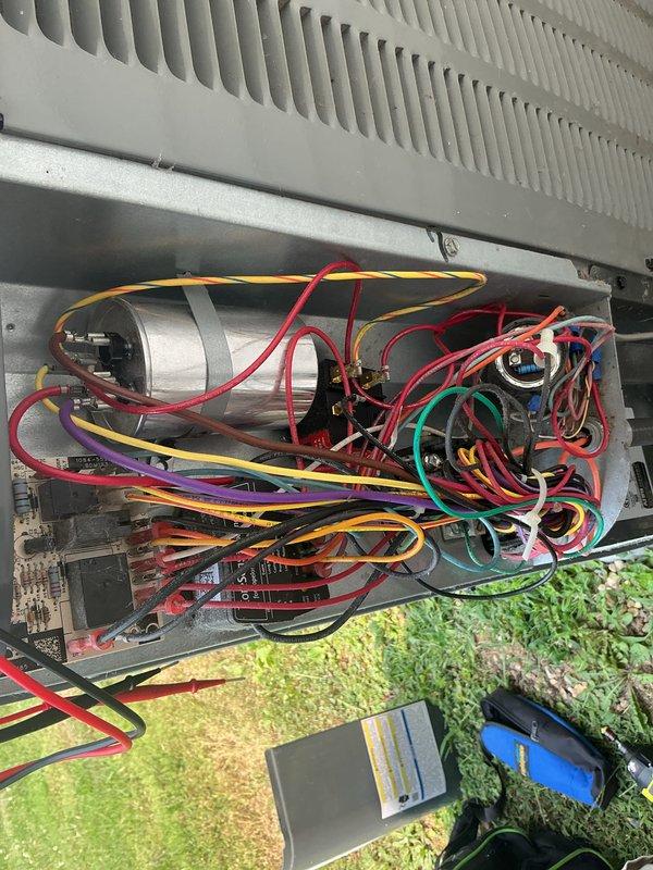 Completed monthly preventive maintenance on residential cooling system. Performed standard CCHP protocol including inspection of outdoor condensing unit, verification of thermostat operation showing 70°F setpoint with 59% humidity reading on ecobee smart thermostat in hold mode. Accessed air handler interior to inspect electrical components, capacitor, and control board functionality. Verified all wire connections secure throughout complex wiring harness including power and control circuits. System operating within normal parameters at time of service completion.