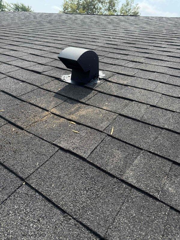 Installed new exhaust fan termination assembly through residential roof with proper weatherproof flashing and sealing. Ran new exhaust duct hose from existing fan unit to the roof termination point, ensuring secure connections and proper ventilation pathway. Verified all penetrations are properly sealed to prevent water infiltration and confirmed exhaust system is functioning correctly.