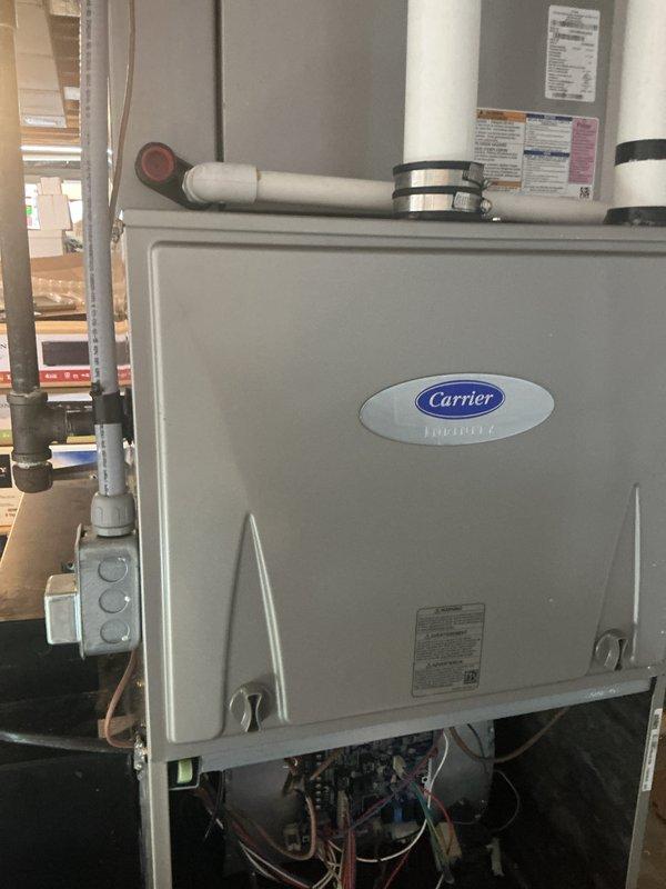 Completed comprehensive maintenance on Carrier air handler system including removal and thorough cleaning of blower assembly, blower wheel, and interior cabinet. Applied coil treatment to evaporator coil in place to enhance heat transfer efficiency and prevent microbial growth. Performed routine monthly cooling system inspection, verified all electrical connections and control board operation, and confirmed proper system functionality upon completion.