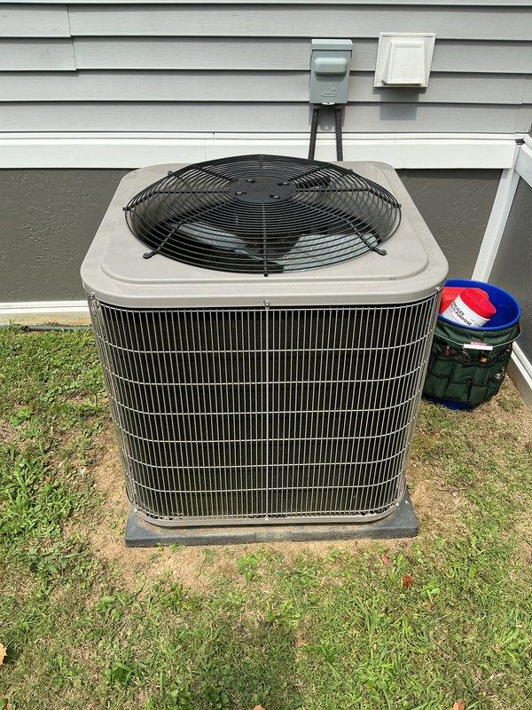 Completed monthly cooling maintenance visit on residential CCHP system. Inspected outdoor condenser unit positioned on concrete pad adjacent to building—verified proper clearances, examined coil fins for debris accumulation, and confirmed fan grille protection in place. Checked electrical connections at exterior disconnect and confirmed secure conduit mounting. Evaluated indoor air handler and replaced 16x20x1 disposable filter showing moderate dust loading with discoloration throughout pleated media. All system components operational and functioning within normal parameters at time of inspection.